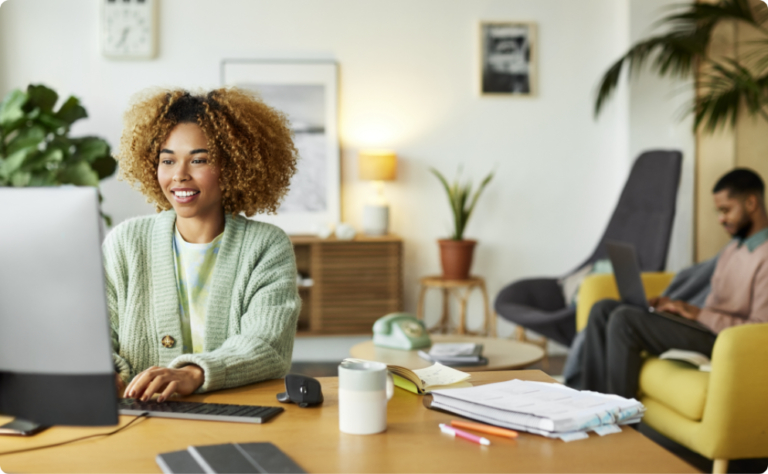 Lady on computer smiling