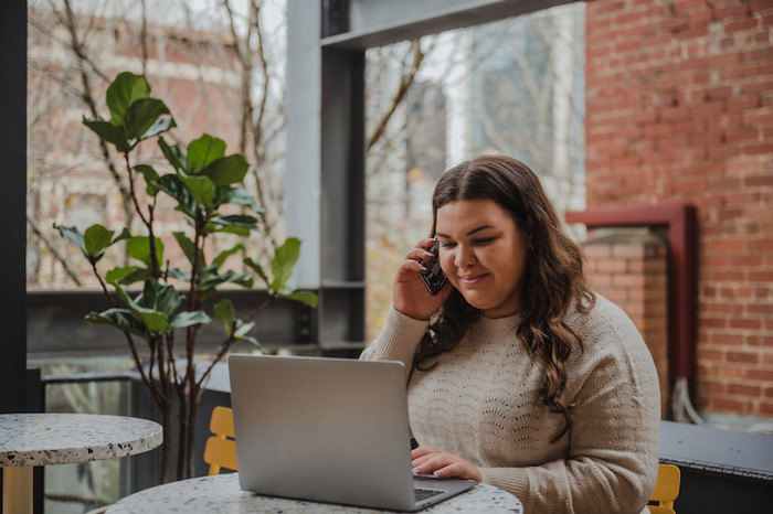 Woman working on her DonorPerfect import module.