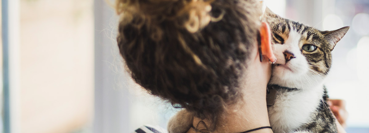 Woman holding cat