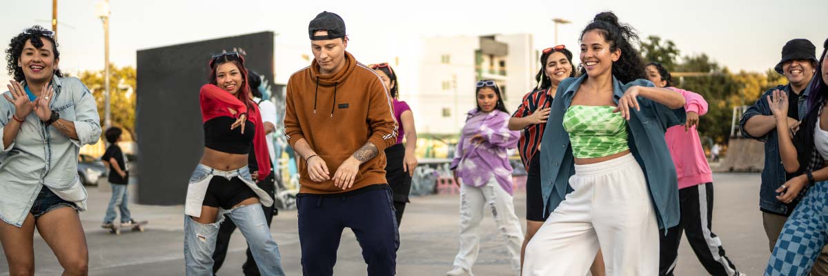 people in park dancing