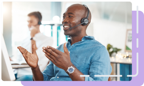 Customer Service representative happily talking with DonorPerfect user.