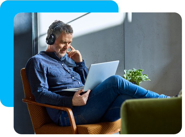 man listening to recorded webinar