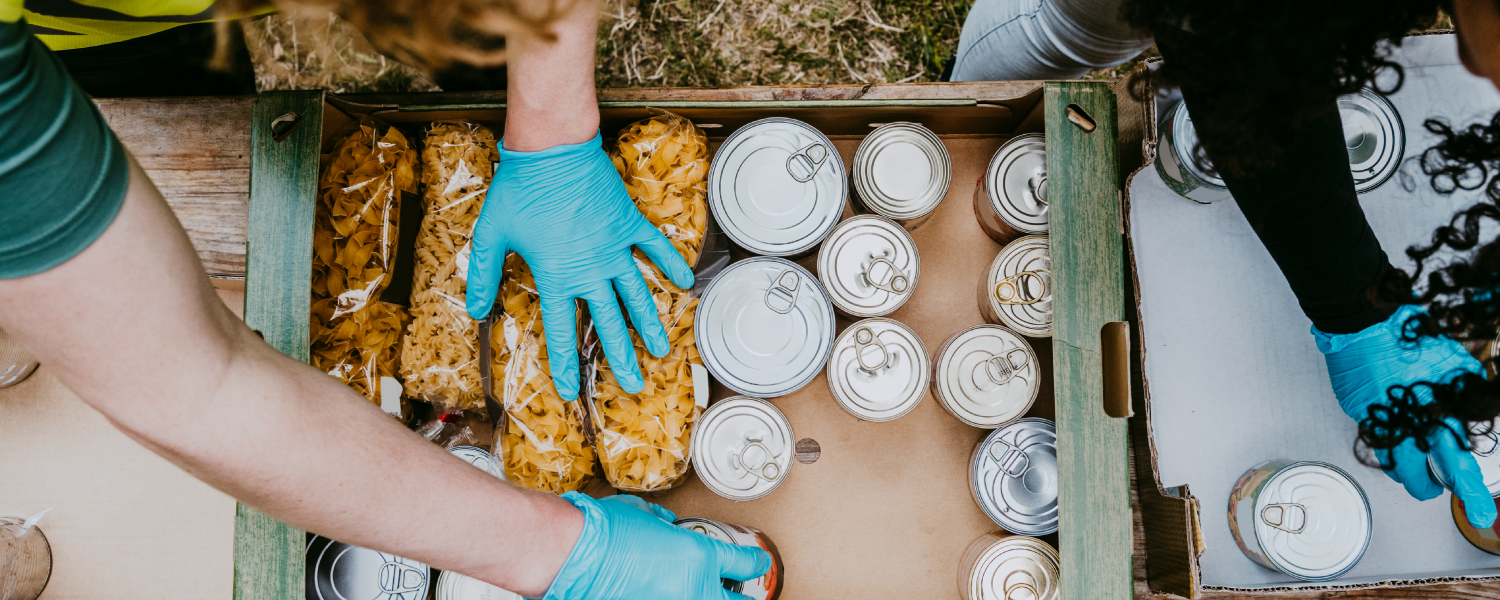 People volunteering at soup kitchen