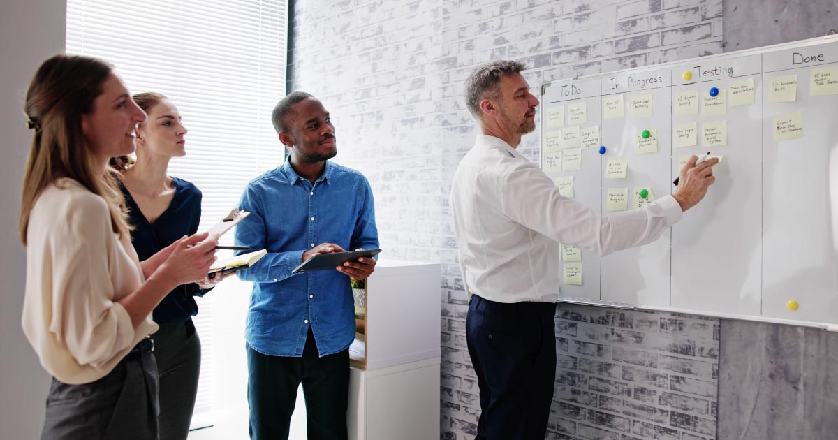 Agile Business Team Using Kanban Task Board
