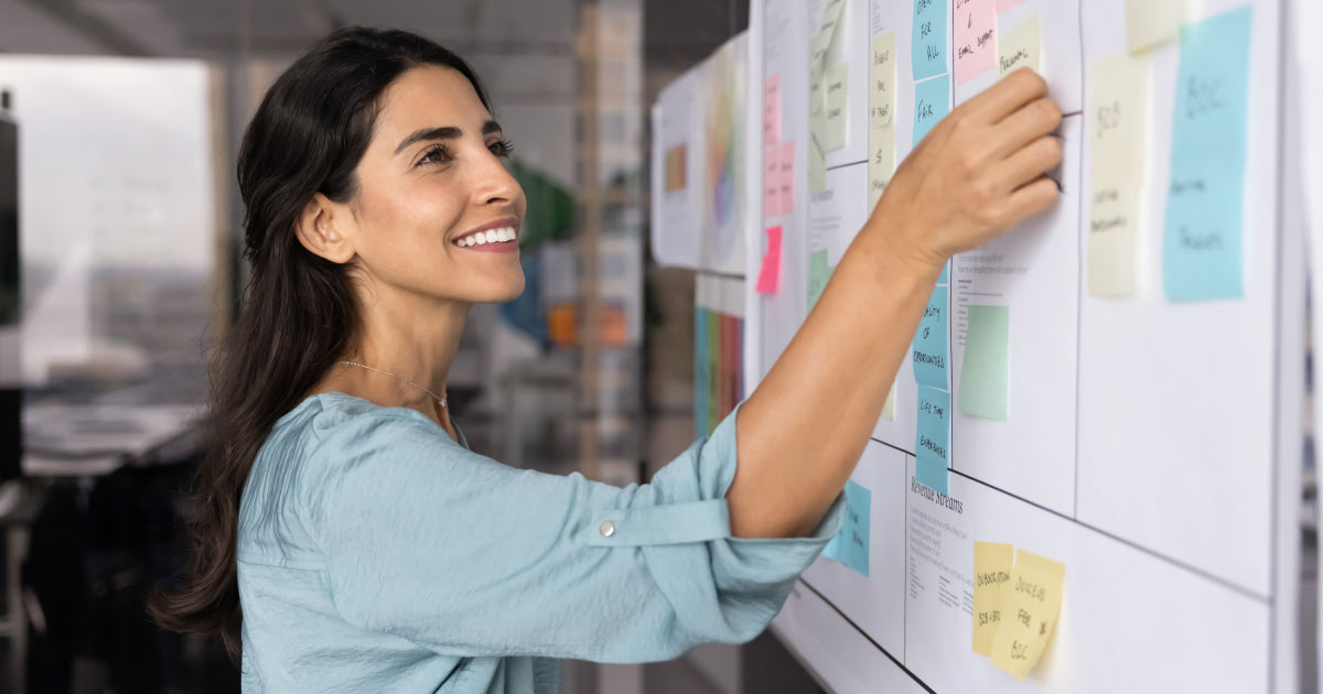 nonprofit employee moving tickets on a kanban board
