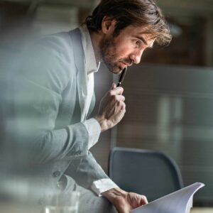 A man thinking pensively.