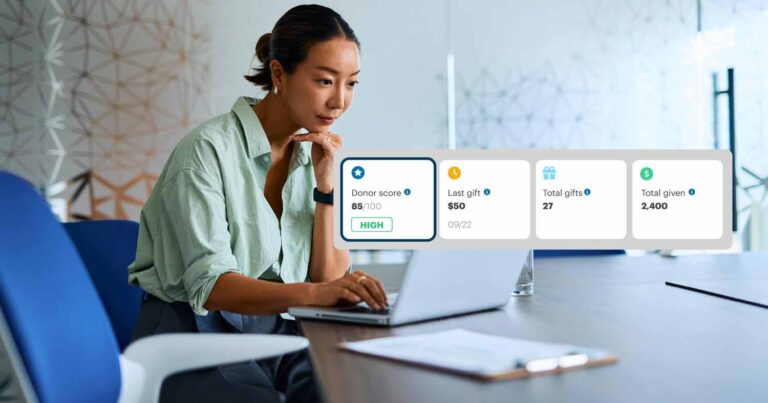 A woman using Donor Scores in DonorPerfect.