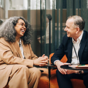 Older woman talking with a potential donor.