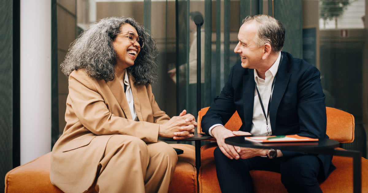 Older woman talking with a potential donor.