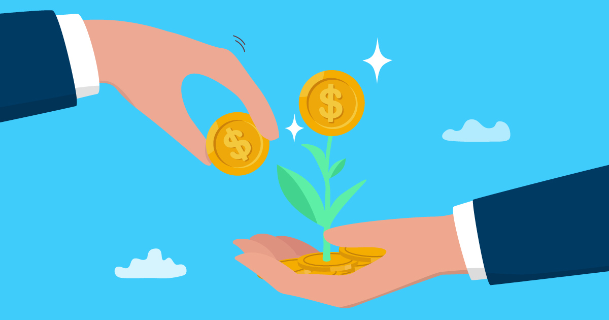 businessman hand put money coin on growing money seedling