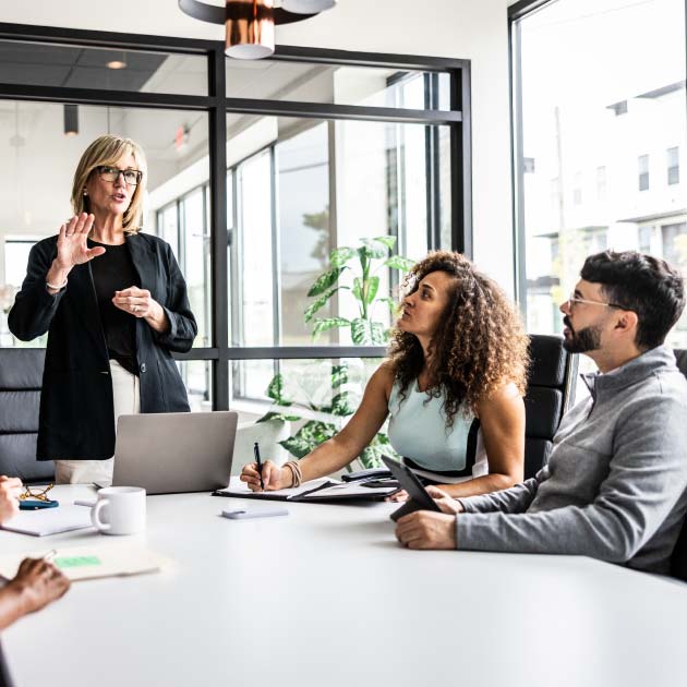 Business colleagues meeting in modern conference room