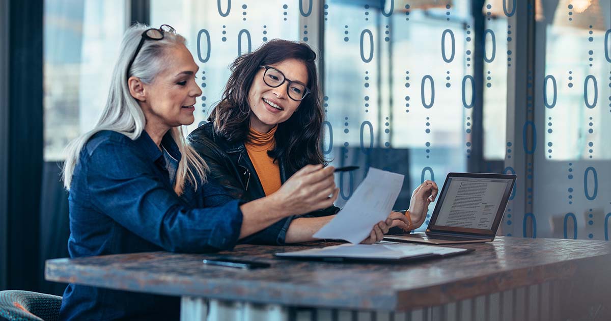 Two women discussing engagement models.