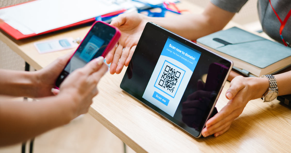 Donor scanning a QR code to easily get to a donation form