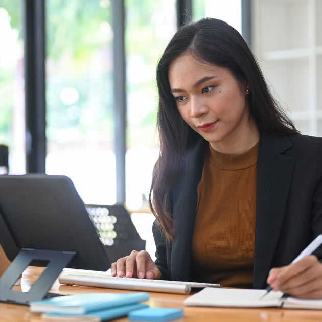 request for proposal featured, lady on computer writing