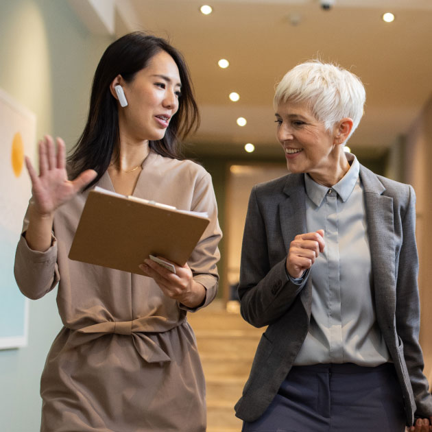 nonprofit employee talking to a potential major donor