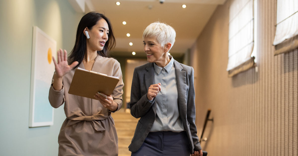 nonprofit employee talking to a potential major donor