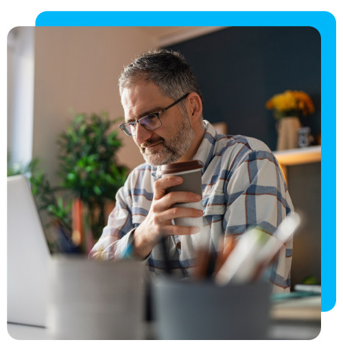 Mature Caucasian man working at his home office.