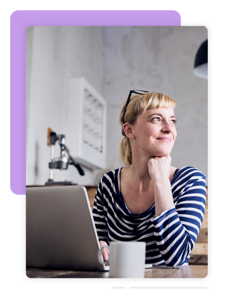 woman thinking off into space, at computer