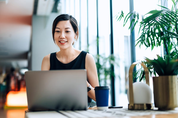 Woman on computer working for nonprofit