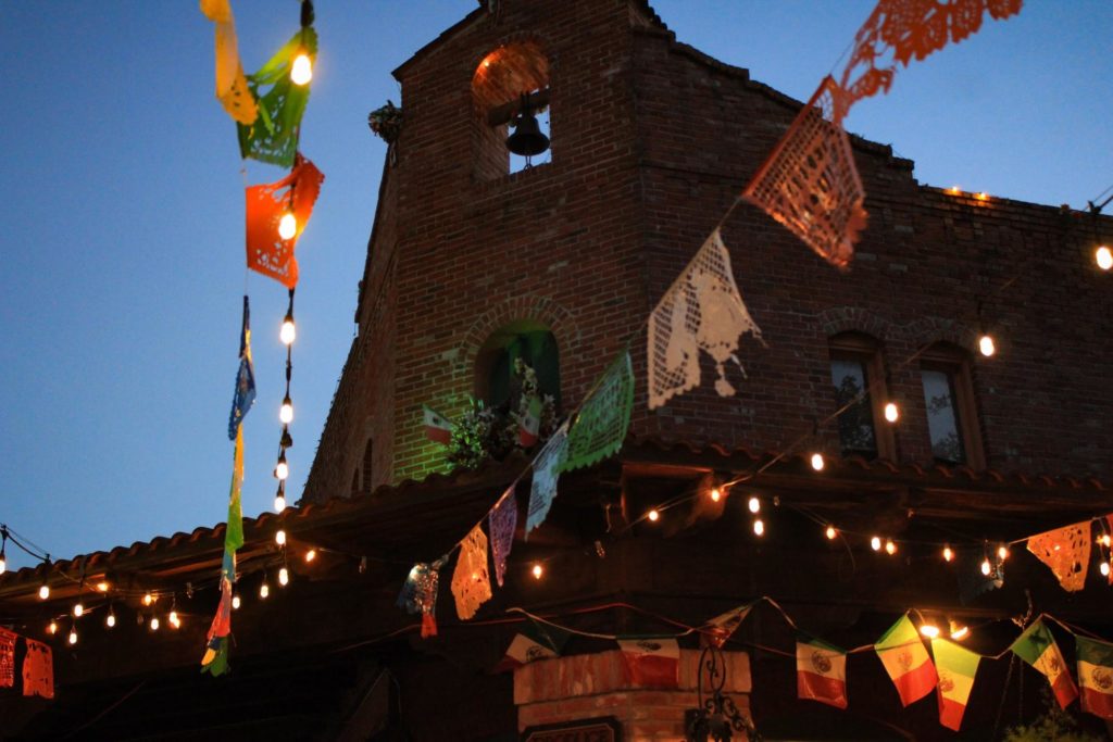 flags hanging from building